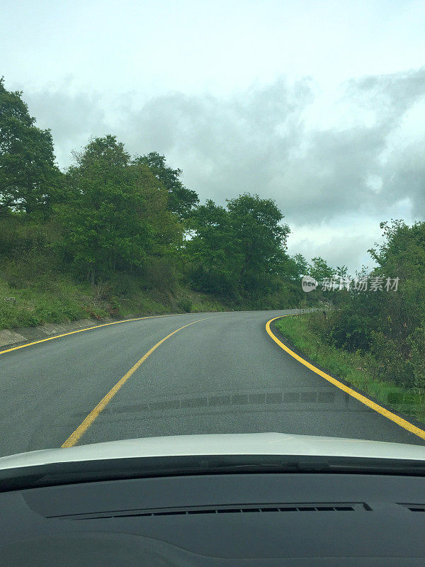 Driving on mountain or country asphalt road